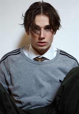 NICLAS K.